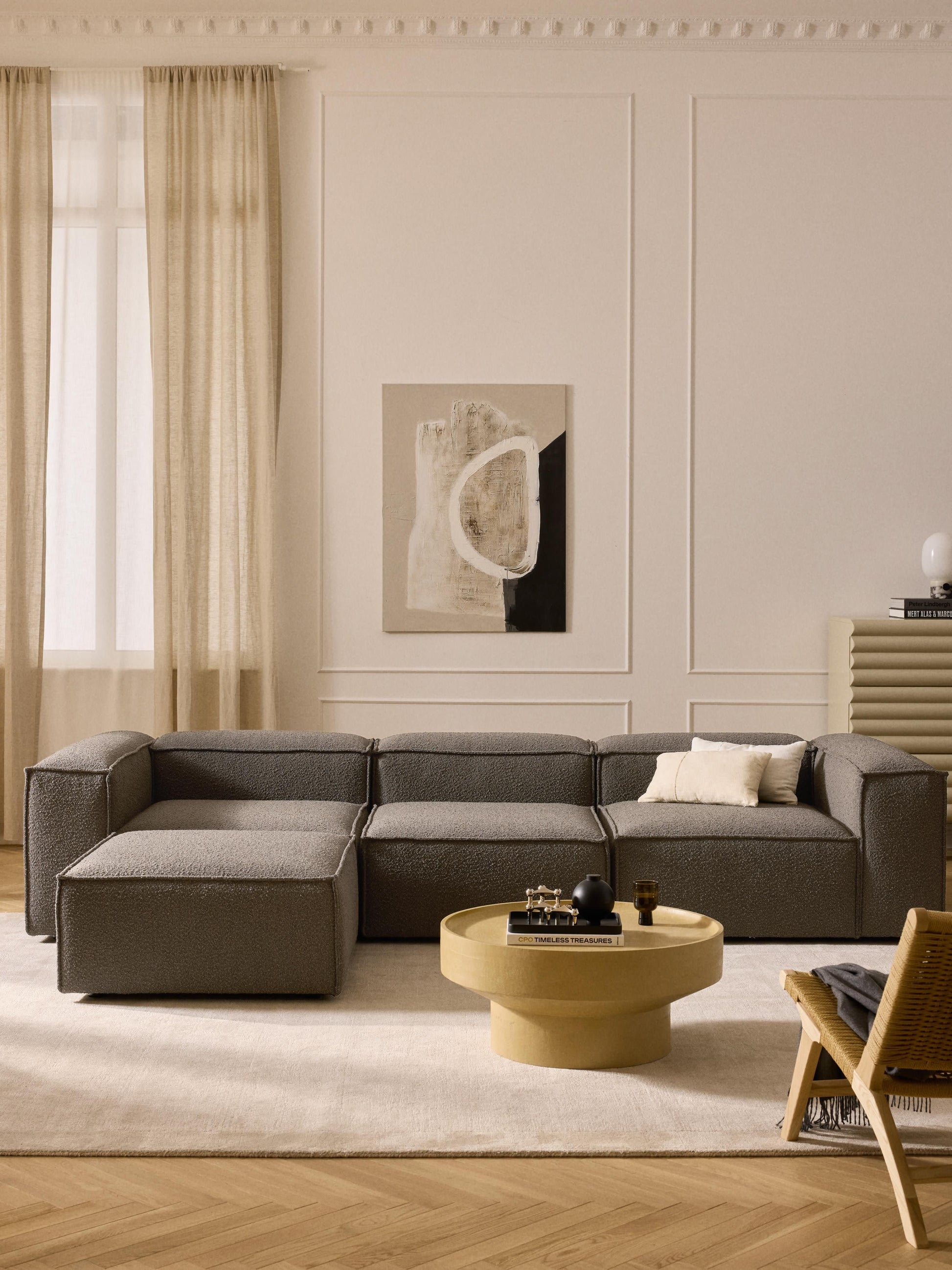 Modulares Sofa Lennon (4-Sitzer) aus Bouclé mit Hocker (links/rechts)