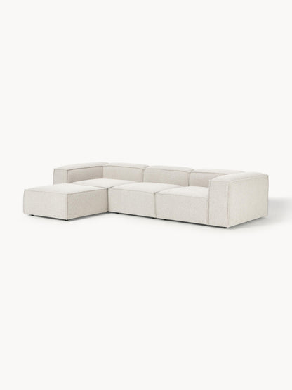 Modulares Sofa Lennon (4-Sitzer) aus Bouclé mit Hocker (links/rechts)