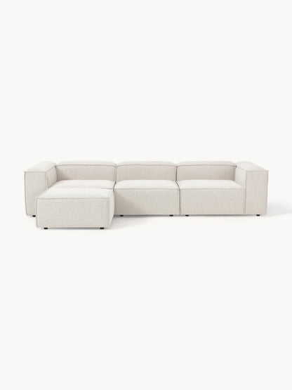 Modulares Sofa Lennon (4-Sitzer) aus Bouclé mit Hocker (links/rechts)
