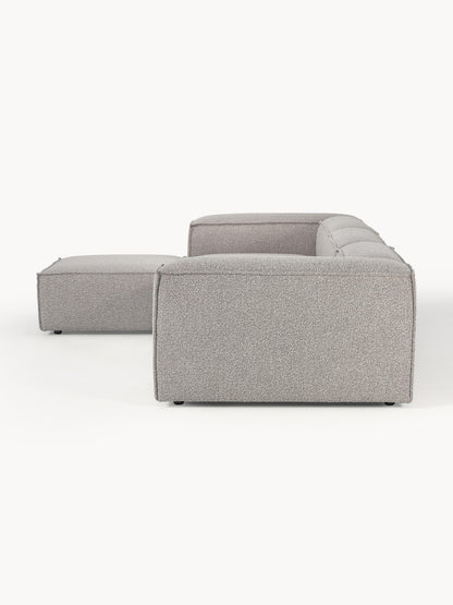 Modulares Sofa Lennon (4-Sitzer) aus Bouclé mit Hocker (links/rechts)