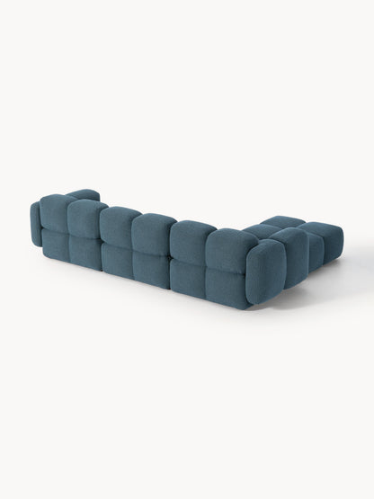 Modulares Sofa Tayla (4-Sitzer) aus Bouclé mit Hocker (links/rechts)