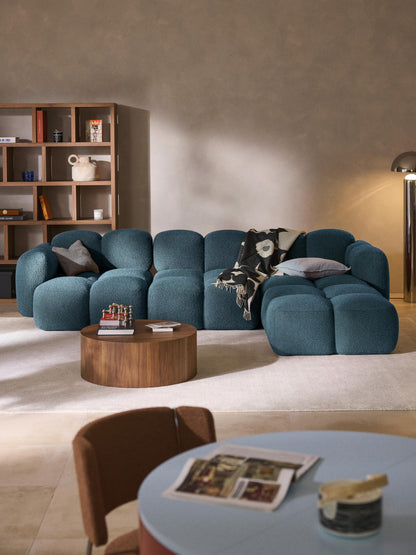 Modulares Sofa Tayla (4-Sitzer) aus Bouclé mit Hocker (links/rechts)