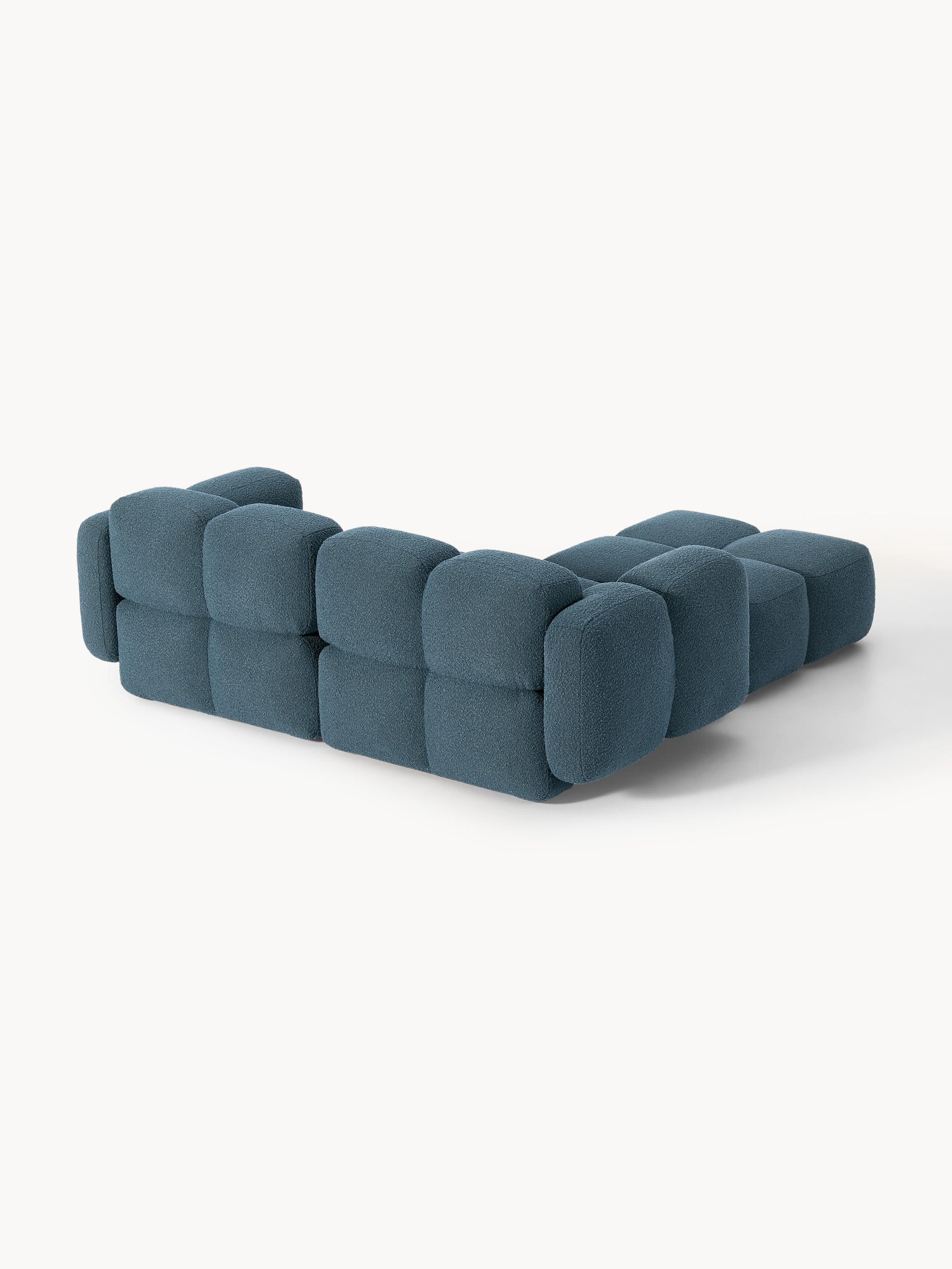 Modulares Sofa Tayla (3-Sitzer) aus Bouclé mit Hocker (links/rechts)