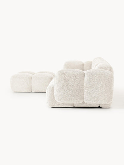 Modulares Sofa Tayla (4-Sitzer) aus Teddy-Bouclé mit Hocker (links/rechts)