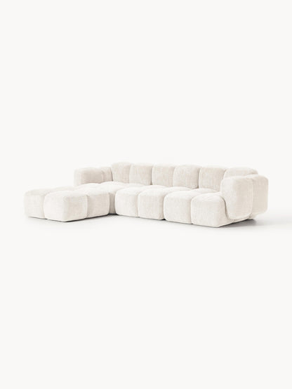 Modulares Sofa Tayla (4-Sitzer) aus Teddy-Bouclé mit Hocker (links/rechts)
