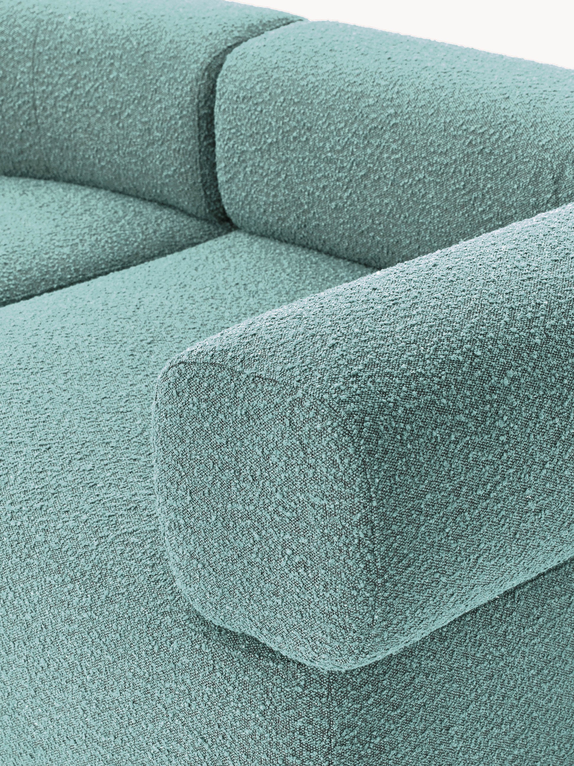 Großes modulares Bouclé-Sofa Anton mit Hocker (links/rechts)