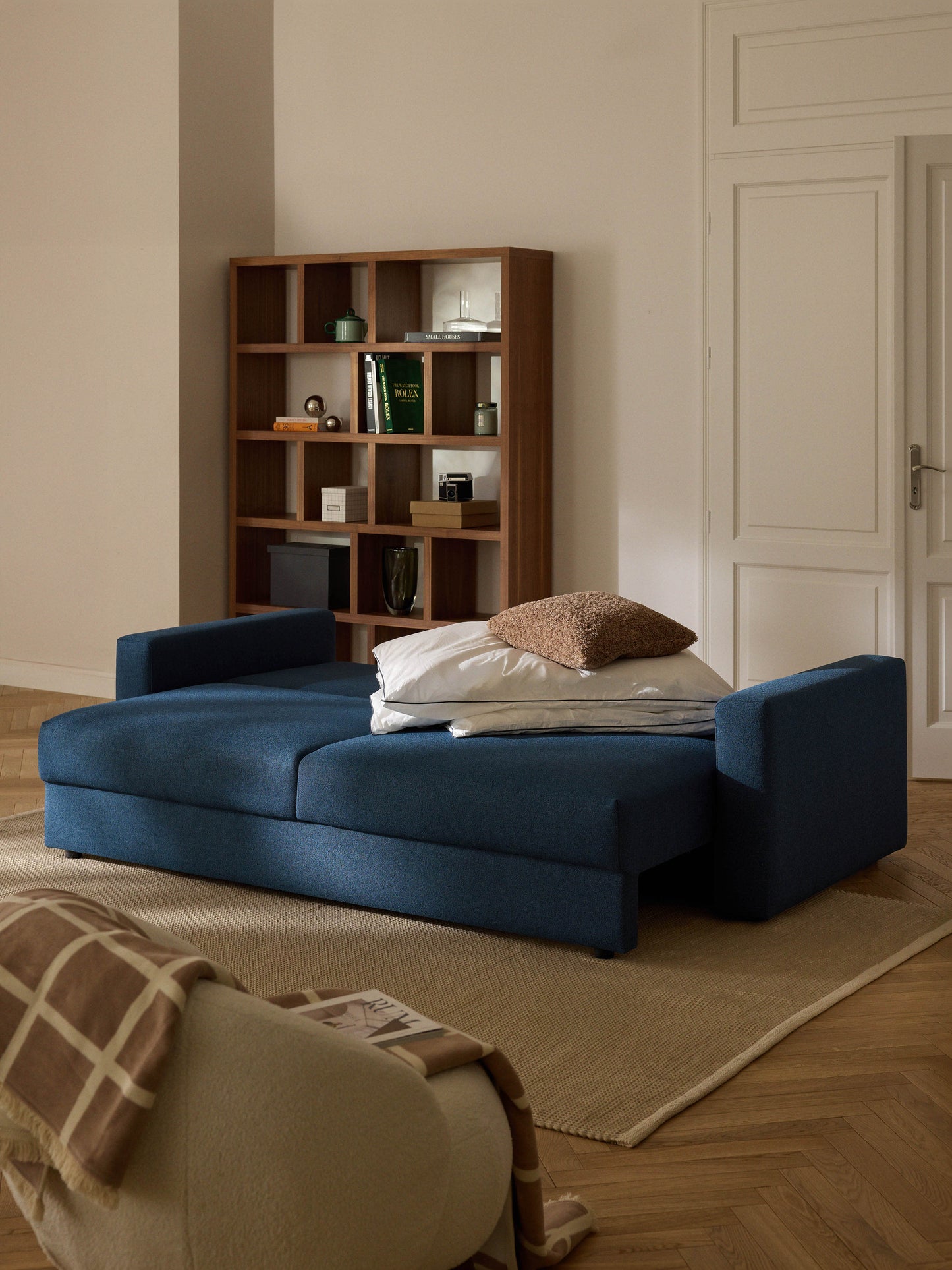 Bouclé-Schlafsofa Tasha (3-Sitzer) mit Stauraum