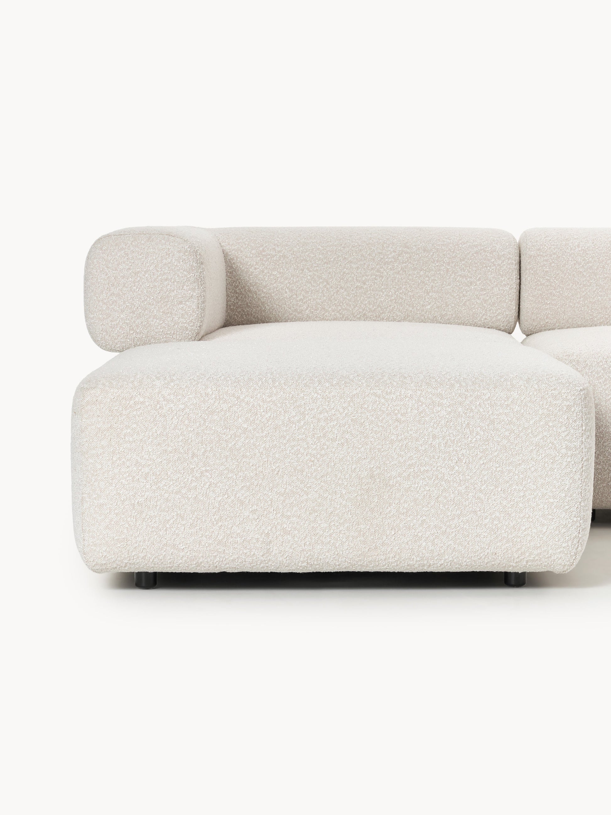 Großes modulares Bouclé-Sofa Anton mit Hocker (links/rechts)