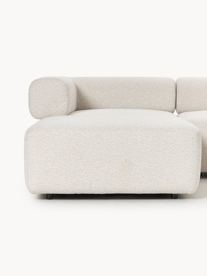 Großes modulares Bouclé-Sofa Anton mit Hocker (links/rechts)
