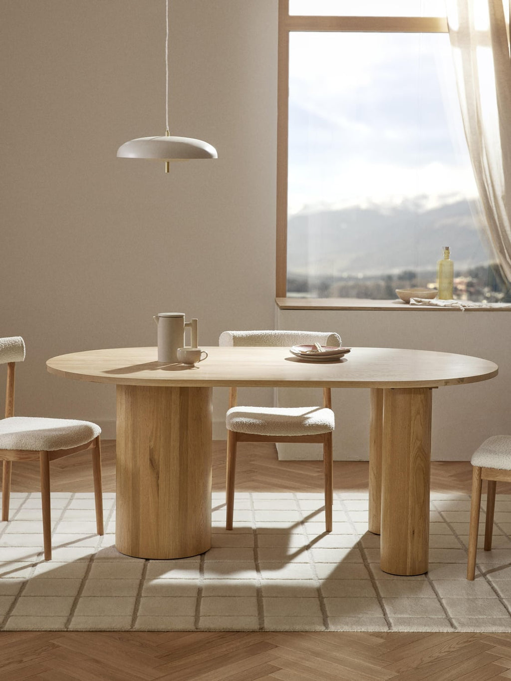 Dunia Oval Dining Table in Oak, in various sizes — Sand