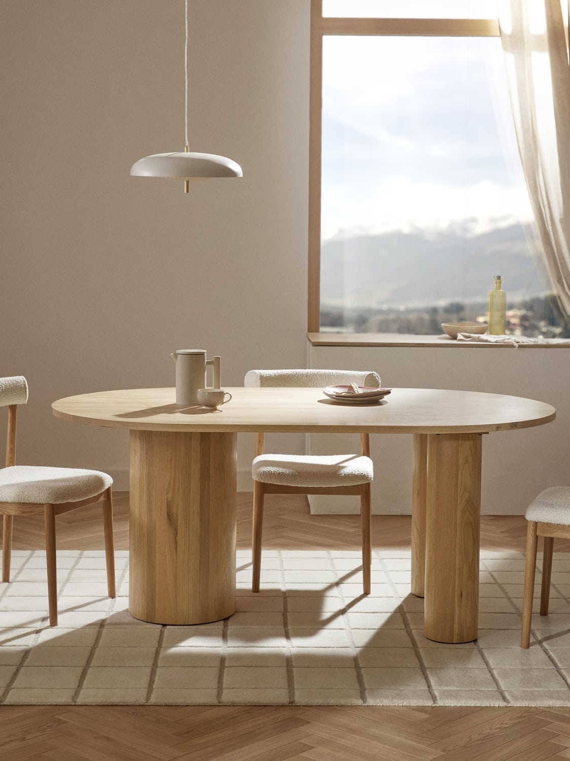 Dunia Oval Dining Table in Oak, in various sizes — Sand